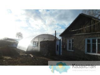 Дом с теплицей Абайский район,п. Агрогородок