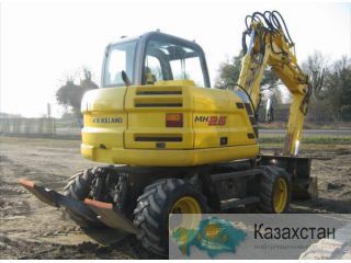 Услуги и аренда колесного экскаватора Алматы