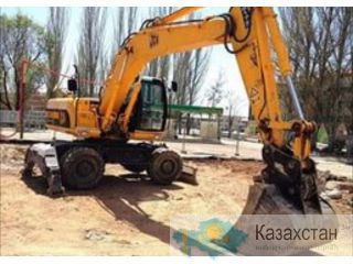 Услуги и аренда колесного экскаватора Петропавловск